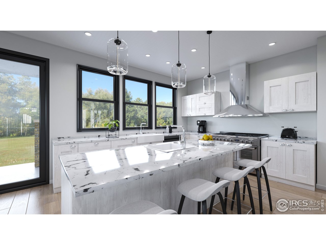 735 14th Street Boulder, CO 80302 - Photo 3 of 11 a kitchen with a table chairs refrigerator and cabinets