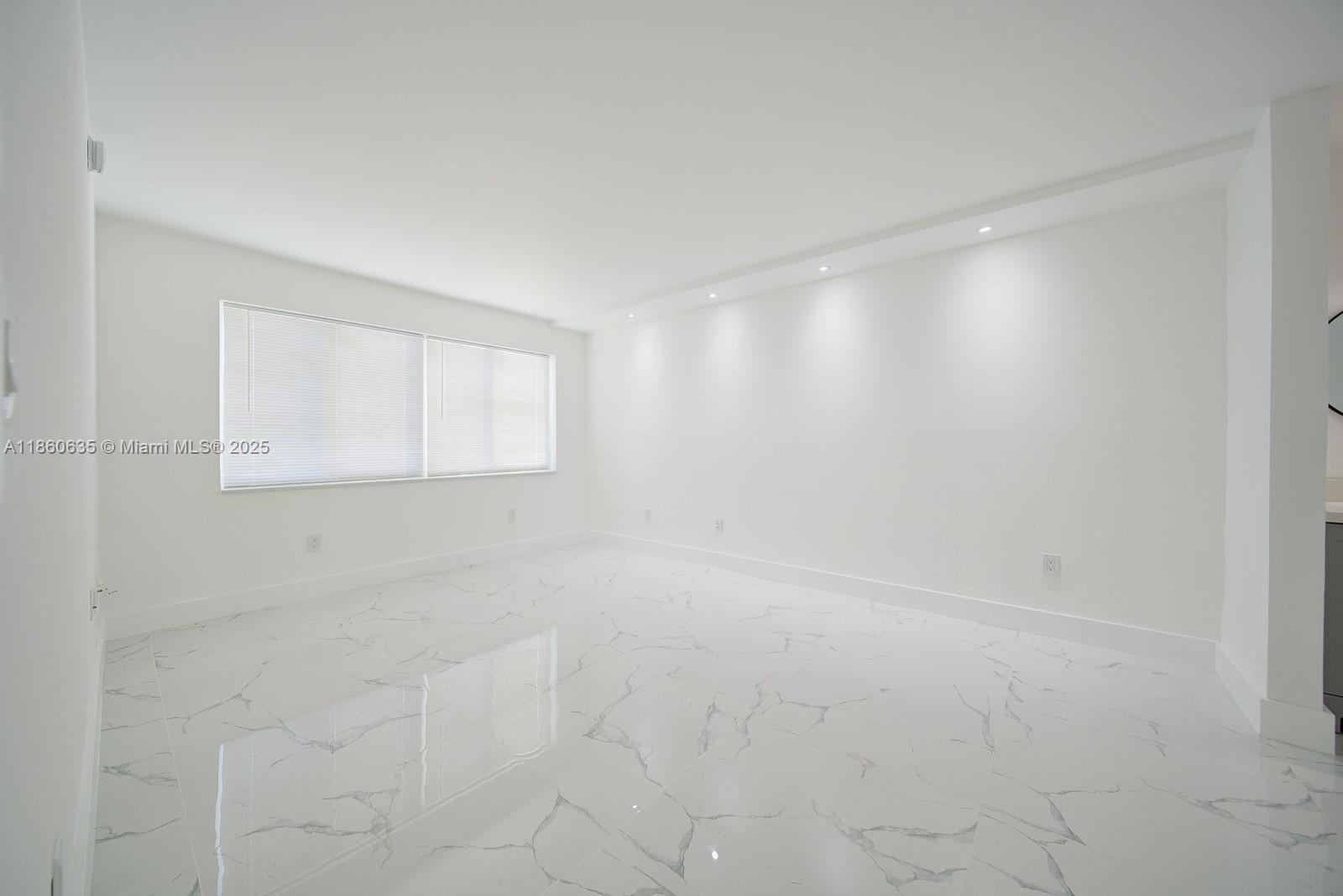 14850 Naranja Lakes Boulevard, Unit B1P Homestead, FL 33032 - Photo 11 of 21 a view of an empty room with a window