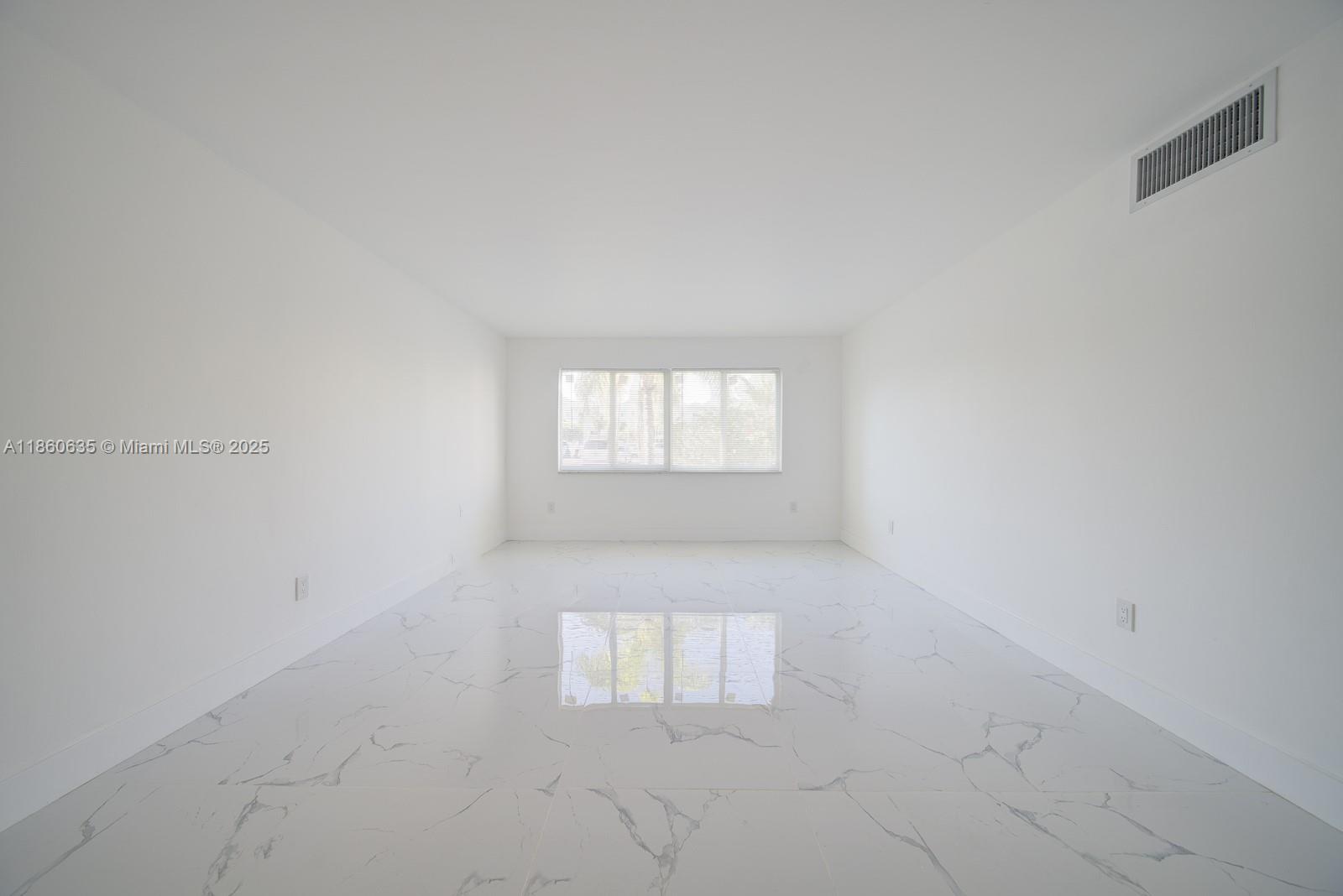 14850 Naranja Lakes Boulevard, Unit B1P Homestead, FL 33032 - Photo 17 of 21 an empty room with windows