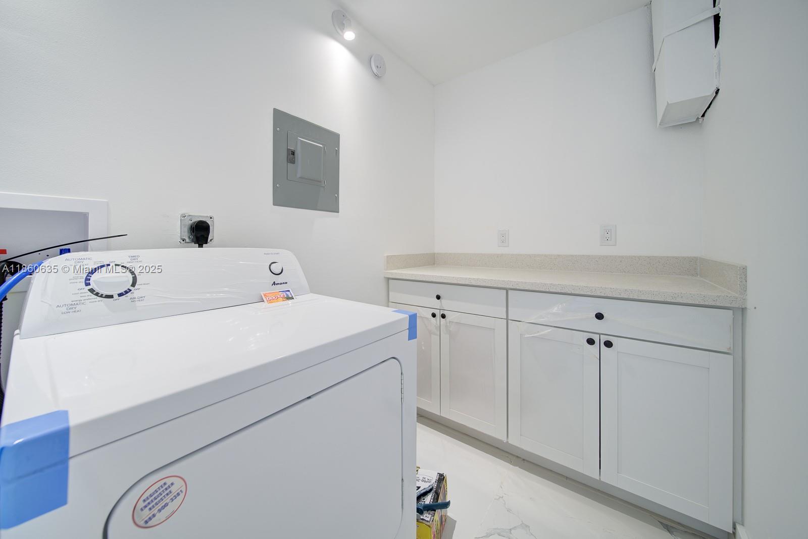 14850 Naranja Lakes Boulevard, Unit B1P Homestead, FL 33032 - Photo 8 of 21 a utility room with dryer and washer