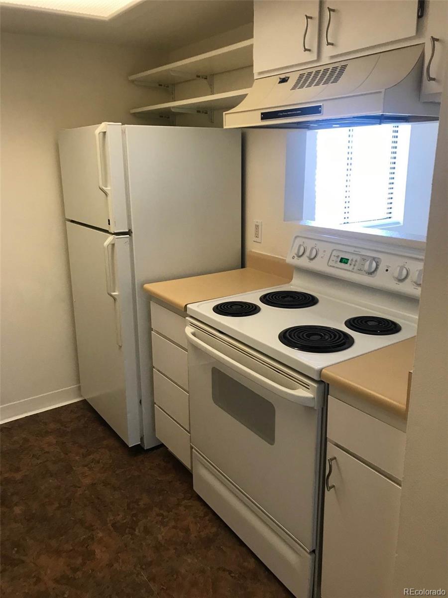 4661 South Decatur Street, Unit 206 Englewood, CO 80110 - Photo 7 of 17 a utility room with dryer and washer