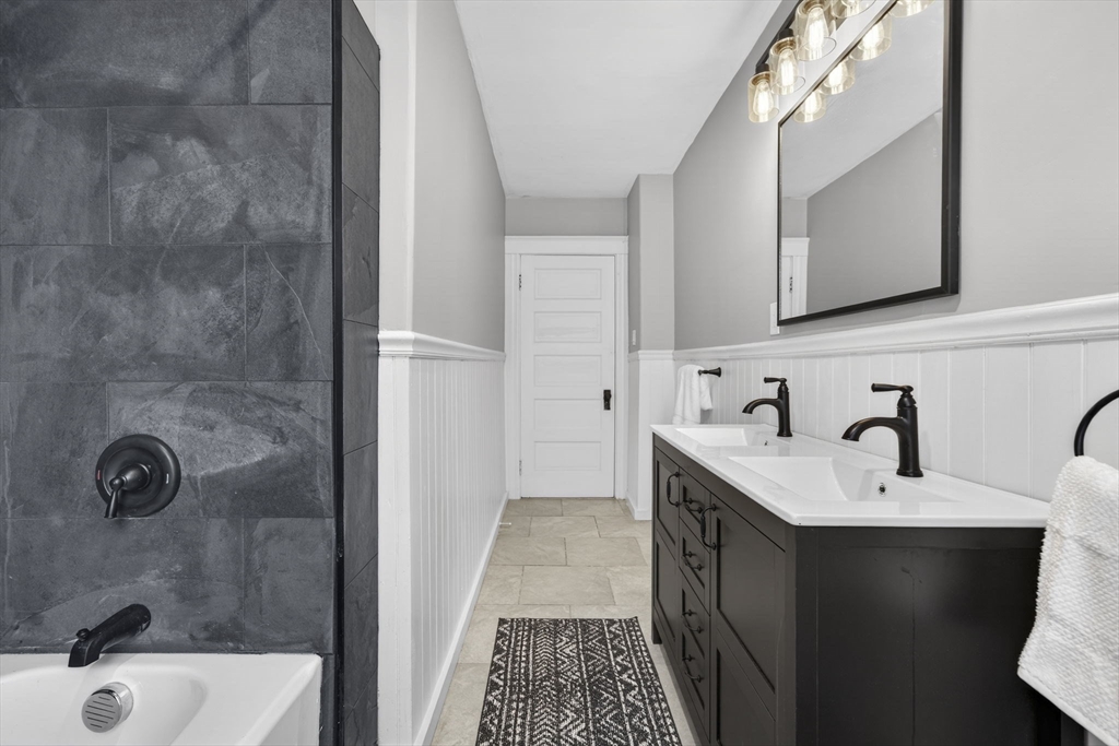22 Maple Street Templeton, MA 01436 - Photo 22 of 28 a bathroom with a sink and a mirror