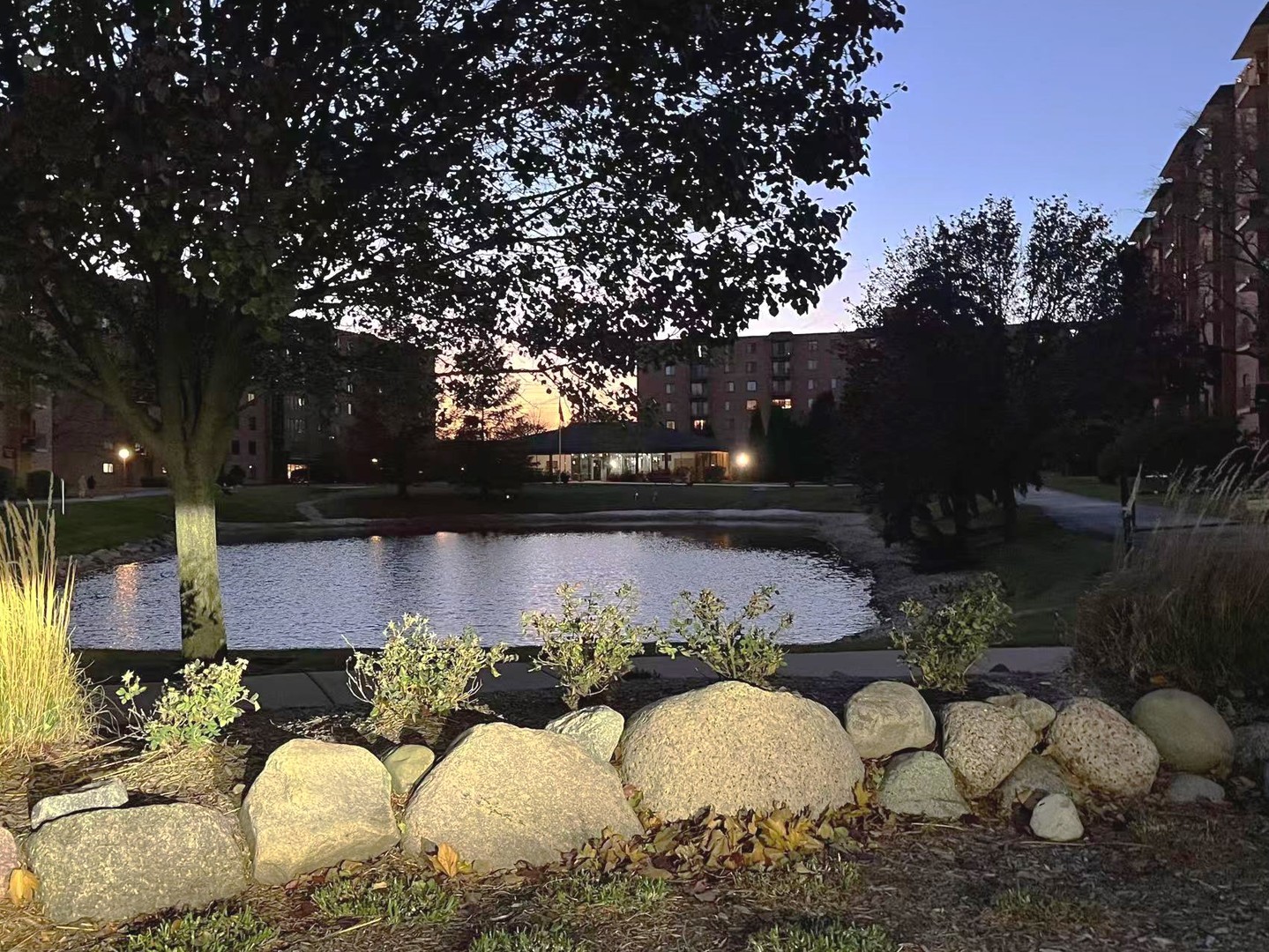 1727 West Crystal Lane, Unit 707B Mount Prospect, IL 60056 - Photo 13 of 13 a swimming pool with outdoor seating and yard