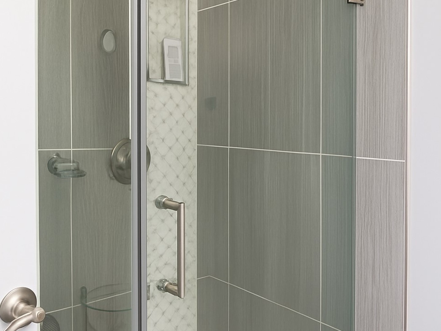 1727 West Crystal Lane, Unit 707B Mount Prospect, IL 60056 - Photo 9 of 13 a bathroom with a glass shower door