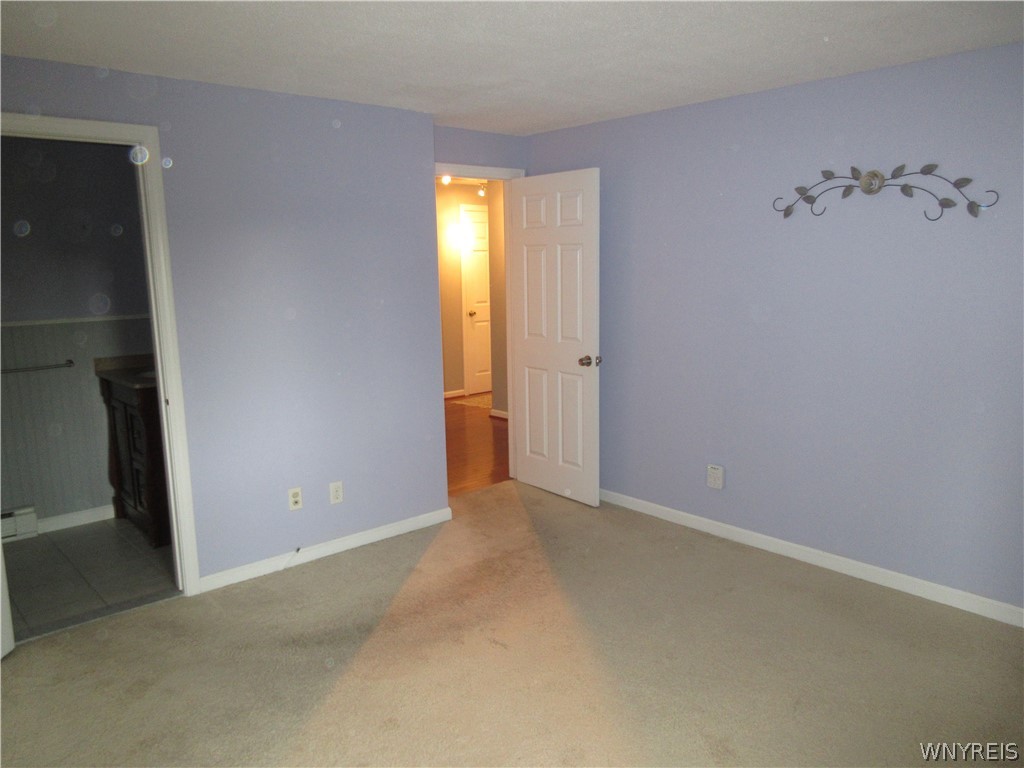 345 South Cayuga Road, Unit A Amherst, NY 14221 - Photo 15 of 24 Primary Bedroom with 1/2 Bath