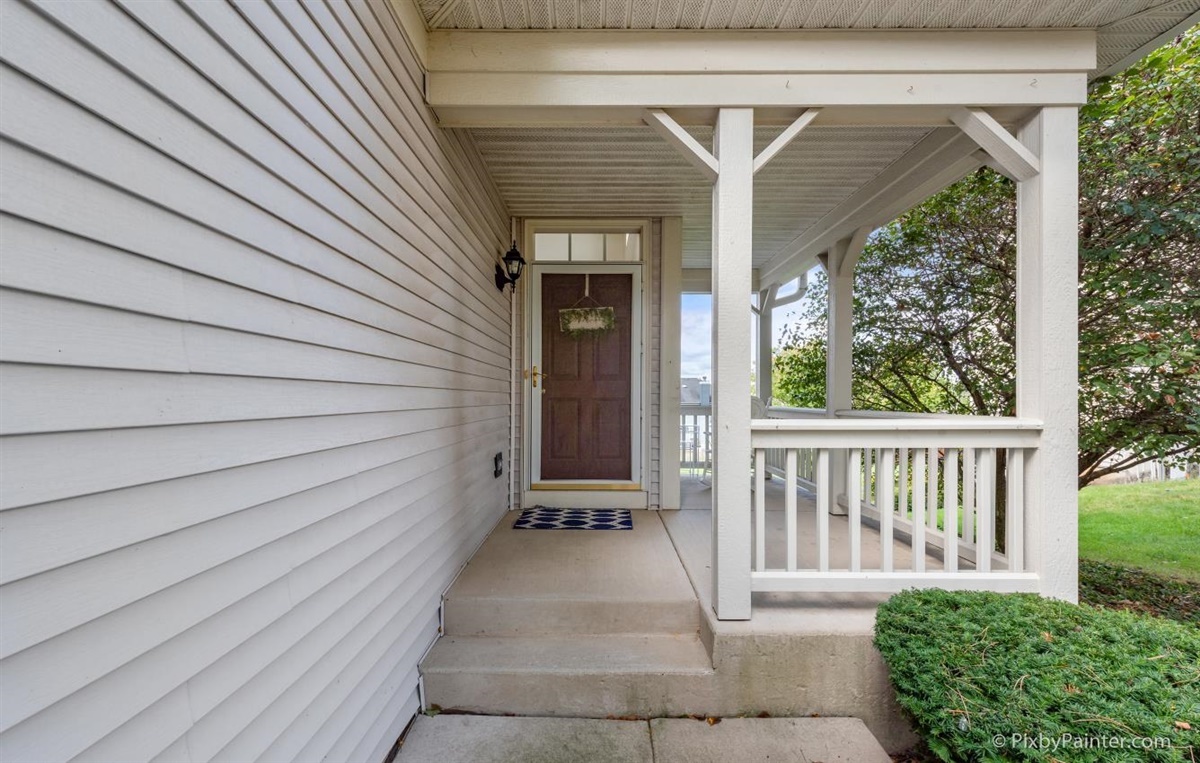 243 Grand Ridge Road St. Charles, IL 60175 - Photo 2 of 29 a view of a back yard with a wooden fence