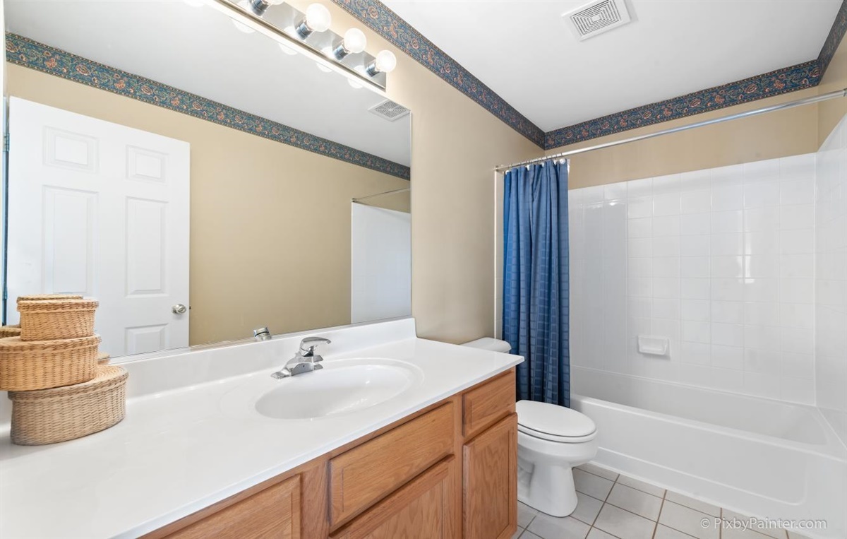 243 Grand Ridge Road St. Charles, IL 60175 - Photo 22 of 29 a bathroom with a sink a toilet and shower