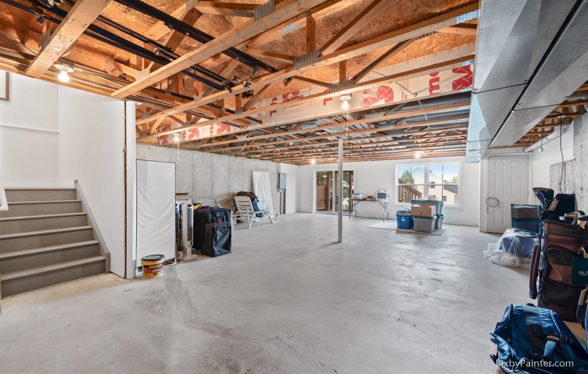243 Grand Ridge Road St. Charles, IL 60175 - Photo 25 of 29 a view of a storage room with furniture and a window