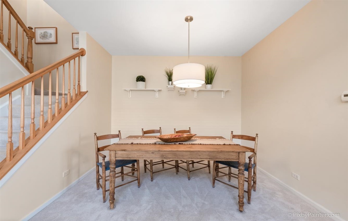 243 Grand Ridge Road St. Charles, IL 60175 - Photo 7 of 29 a table and chairs in a room