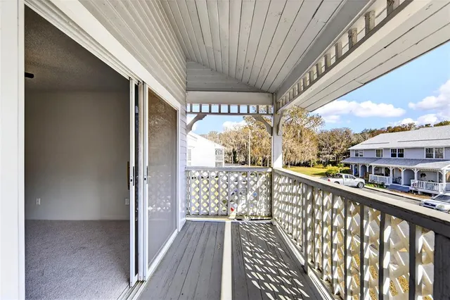 a view of a balcony with city view