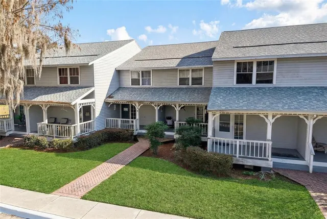 a view of front of house with a yard