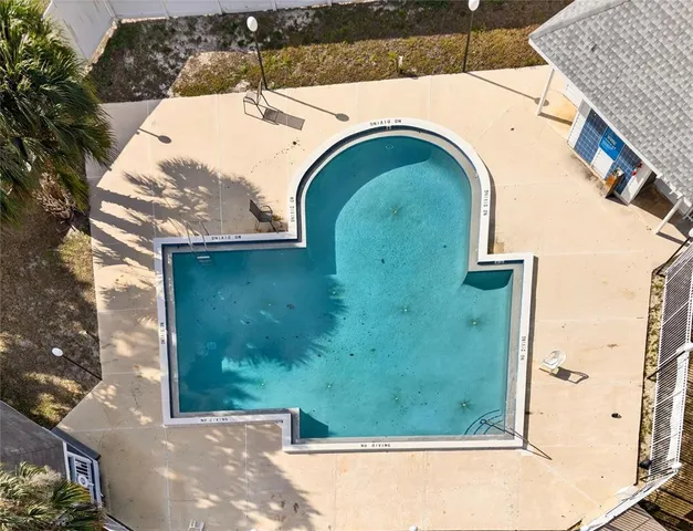 a terrace with outdoor seating and city view