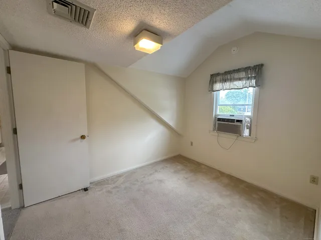 an empty room with window