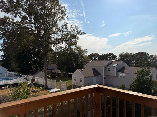 a view of a house with a roof deck