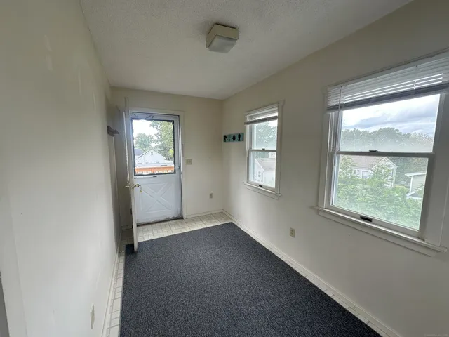 an empty room with windows