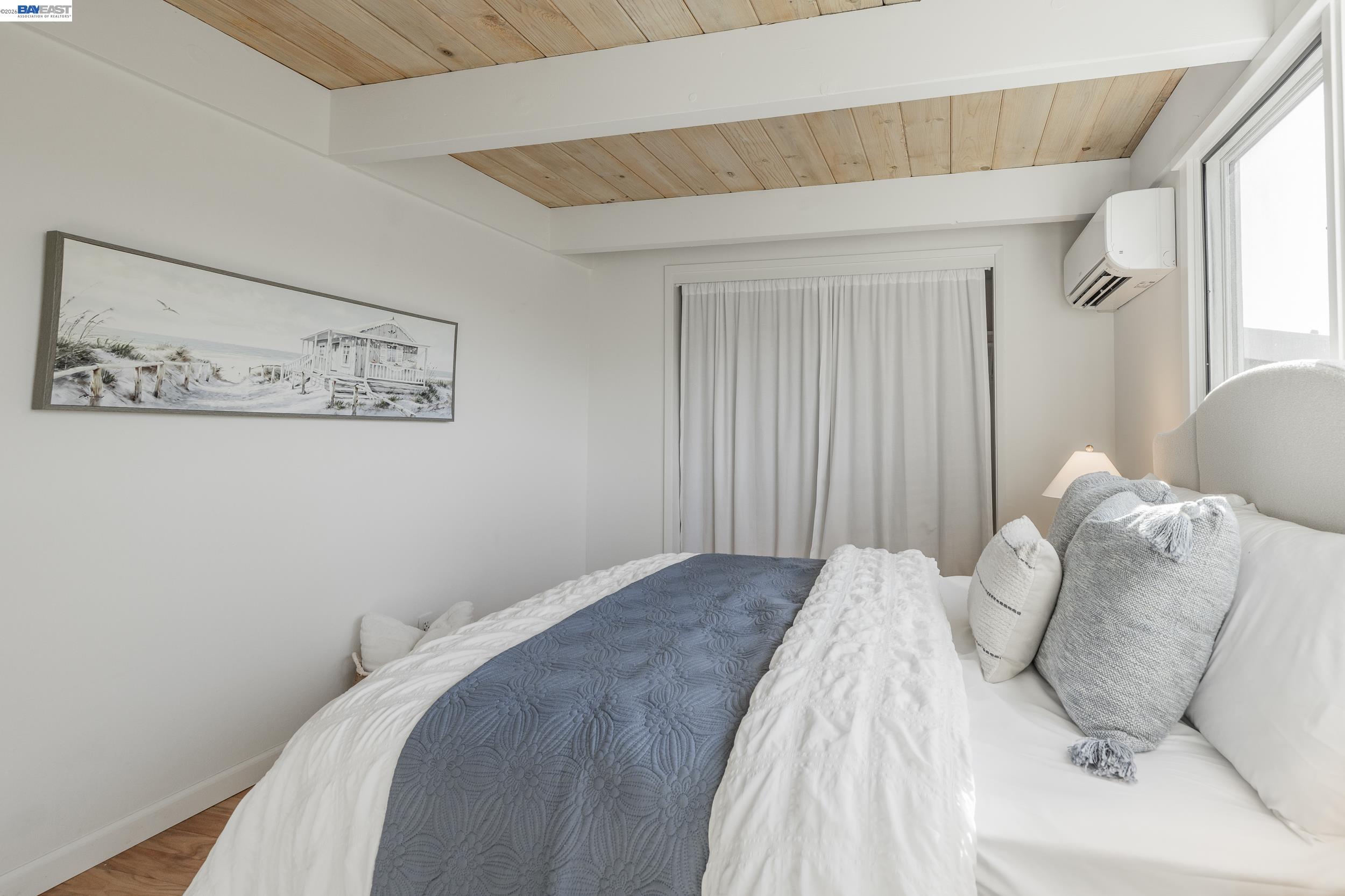 148 Ridgeway Avenue Fairfax, CA 94930 - Photo 12 of 31 a bedroom with a bed and a window