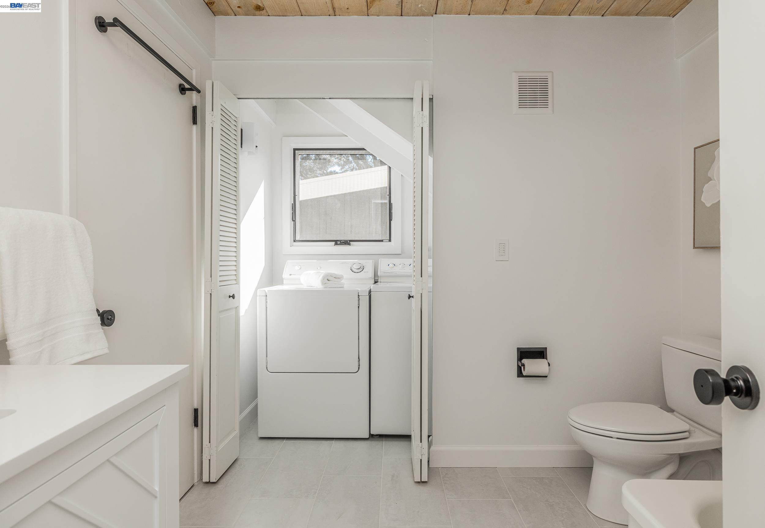 148 Ridgeway Avenue Fairfax, CA 94930 - Photo 18 of 31 a white toilet sitting next to a bathroom sink