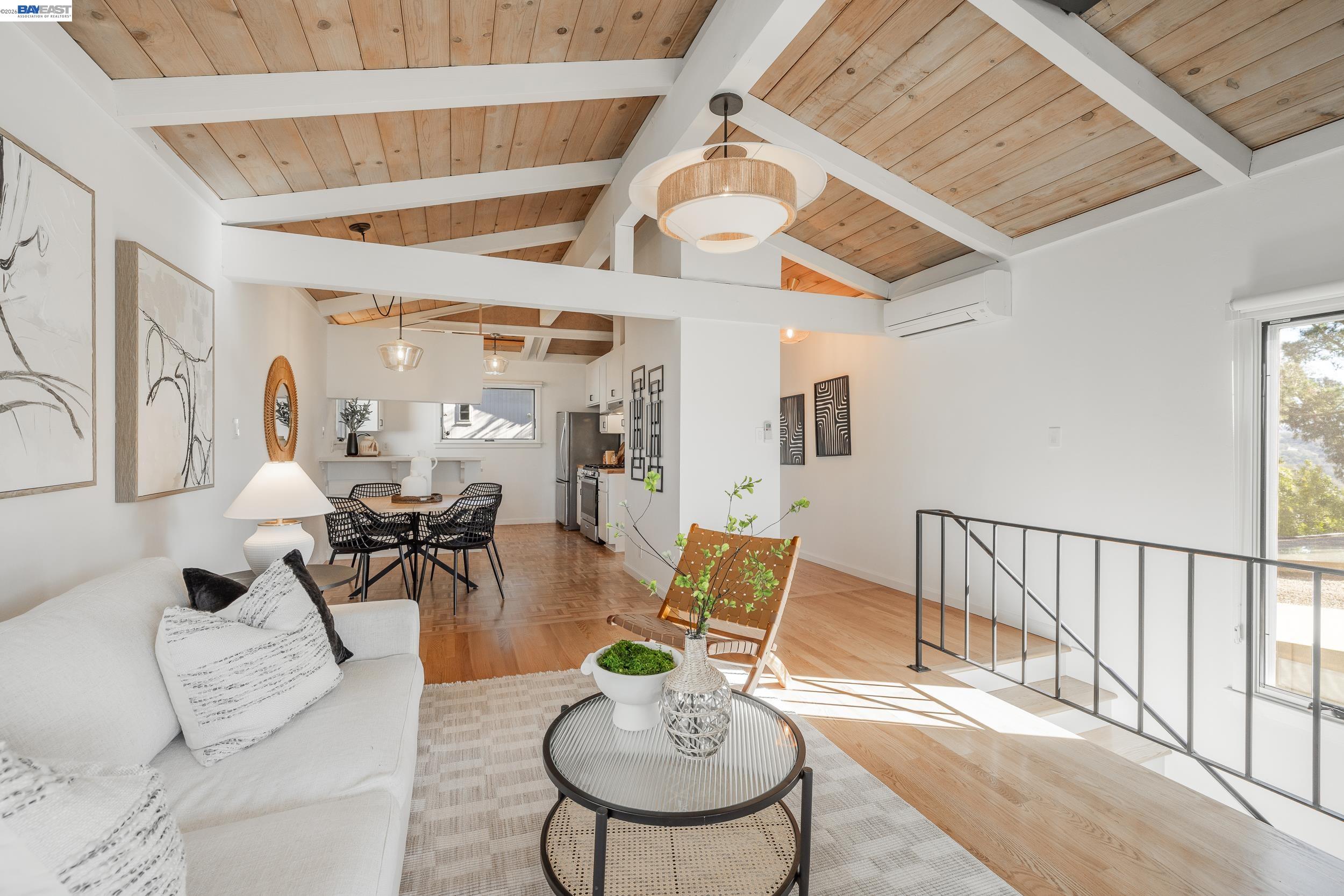 148 Ridgeway Avenue Fairfax, CA 94930 - Photo 2 of 31 a living room with furniture and a dining table