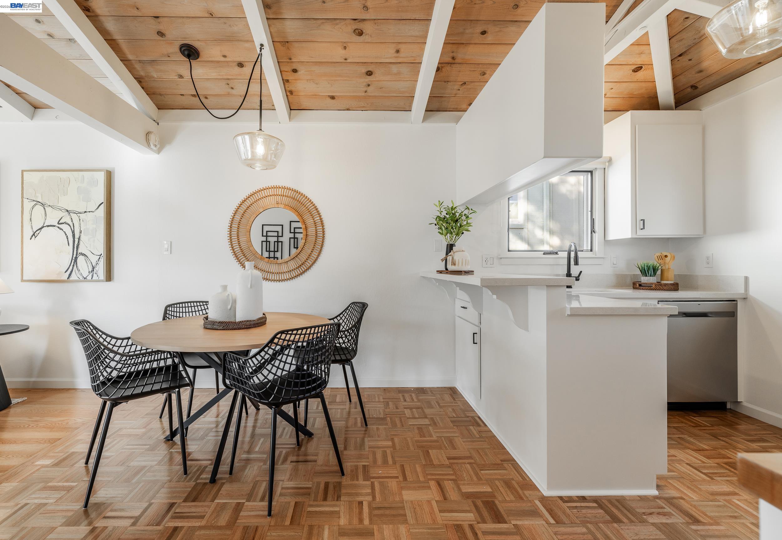 148 Ridgeway Avenue Fairfax, CA 94930 - Photo 4 of 31 a view of a kitchen with a table and chairs