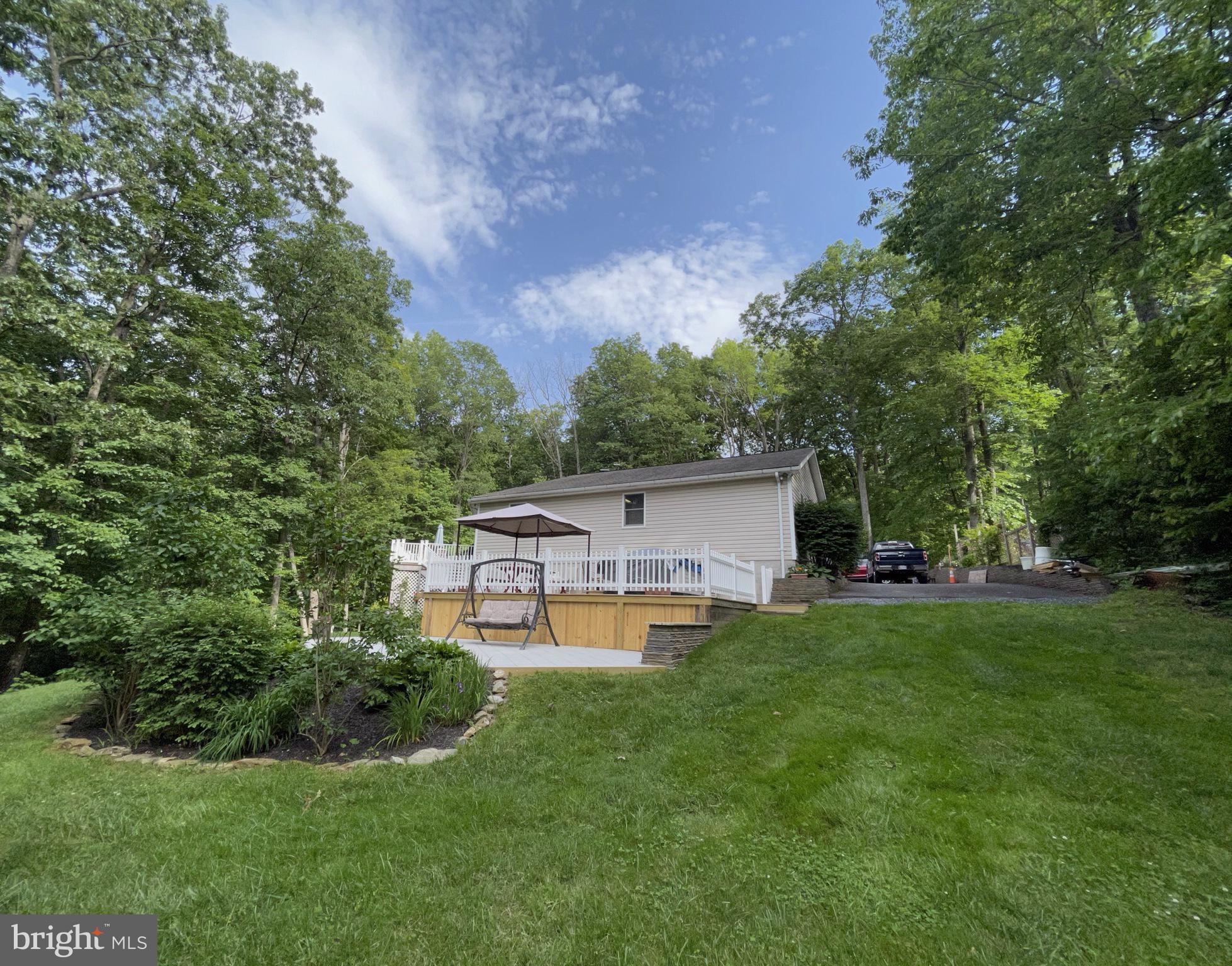 3784 Roop Road New Windsor, MD 21776 - Photo 43 of 49 Back stone patio