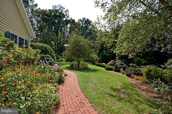 18600 Gunpowder Road Hampstead, MD 21074 - Photo 14 of 21 a view of a pathway with a house in the background