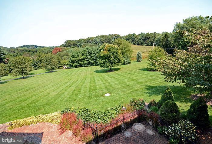 18600 Gunpowder Road Hampstead, MD 21074 - Photo 4 of 21 a view of a garden with a lake