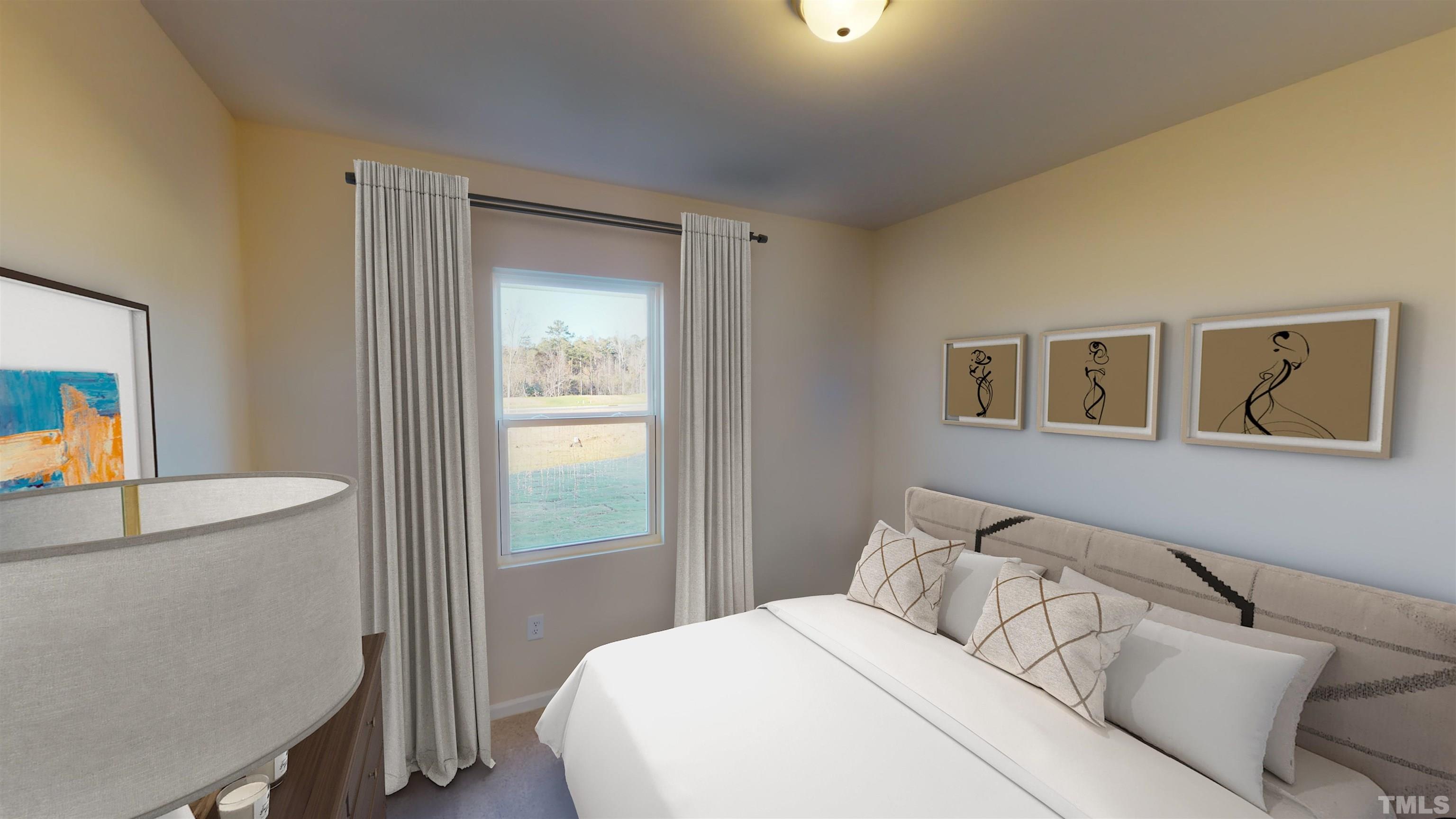 3517 Dragonfly River Raleigh, NC 27604 - Photo 14 of 27 a bedroom with a bed and a painting on the wall