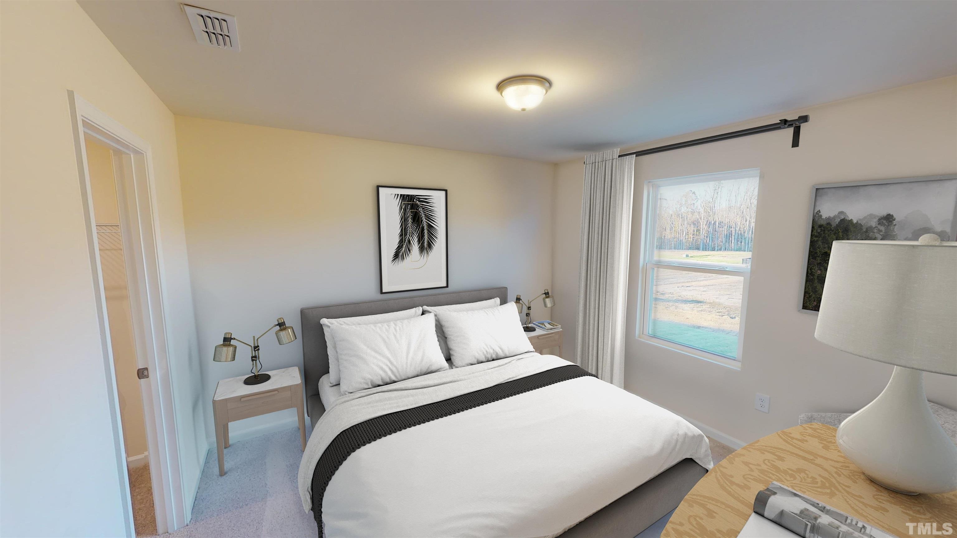 3517 Dragonfly River Raleigh, NC 27604 - Photo 17 of 27 a bedroom with a bed and a window