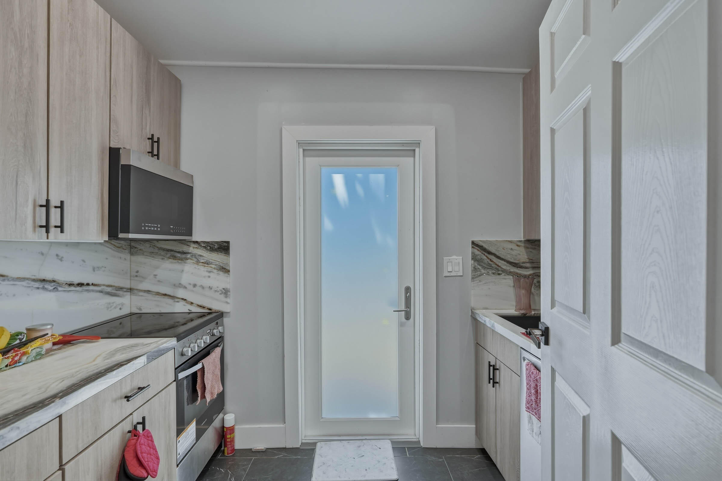 2805 Flagler Avenue Key West, FL 33040 - Photo 13 of 53 a kitchen with a stove and a microwave