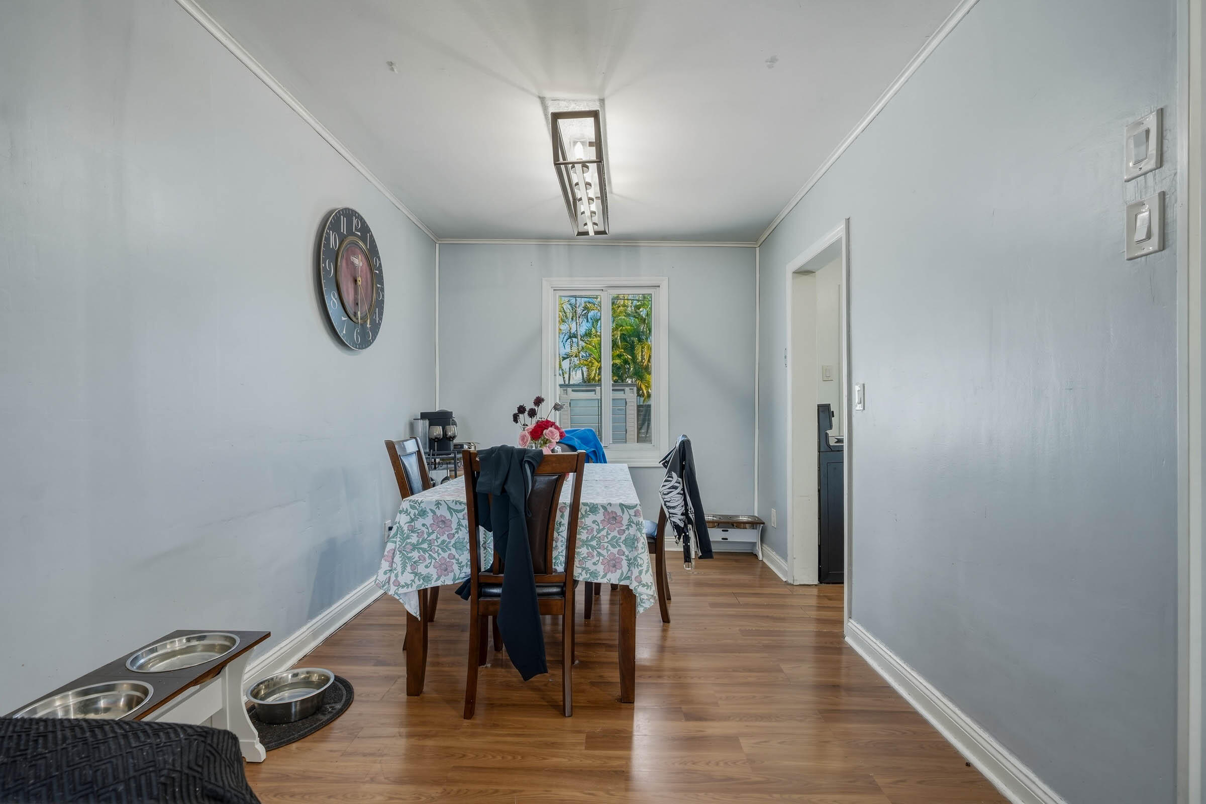 2805 Flagler Avenue Key West, FL 33040 - Photo 31 of 53 a view of a dining room with furniture and a chandelier
