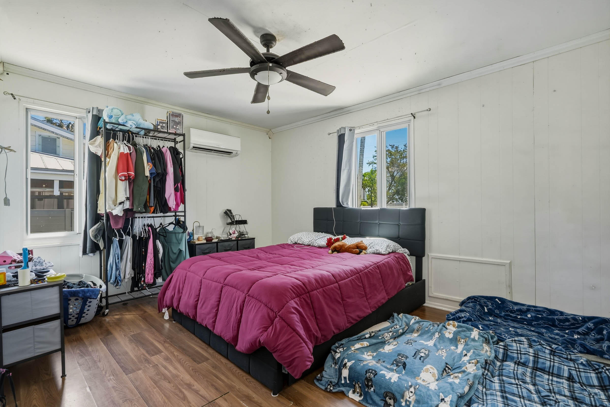 2805 Flagler Avenue Key West, FL 33040 - Photo 37 of 53 a bedroom with a bed and a chandelier