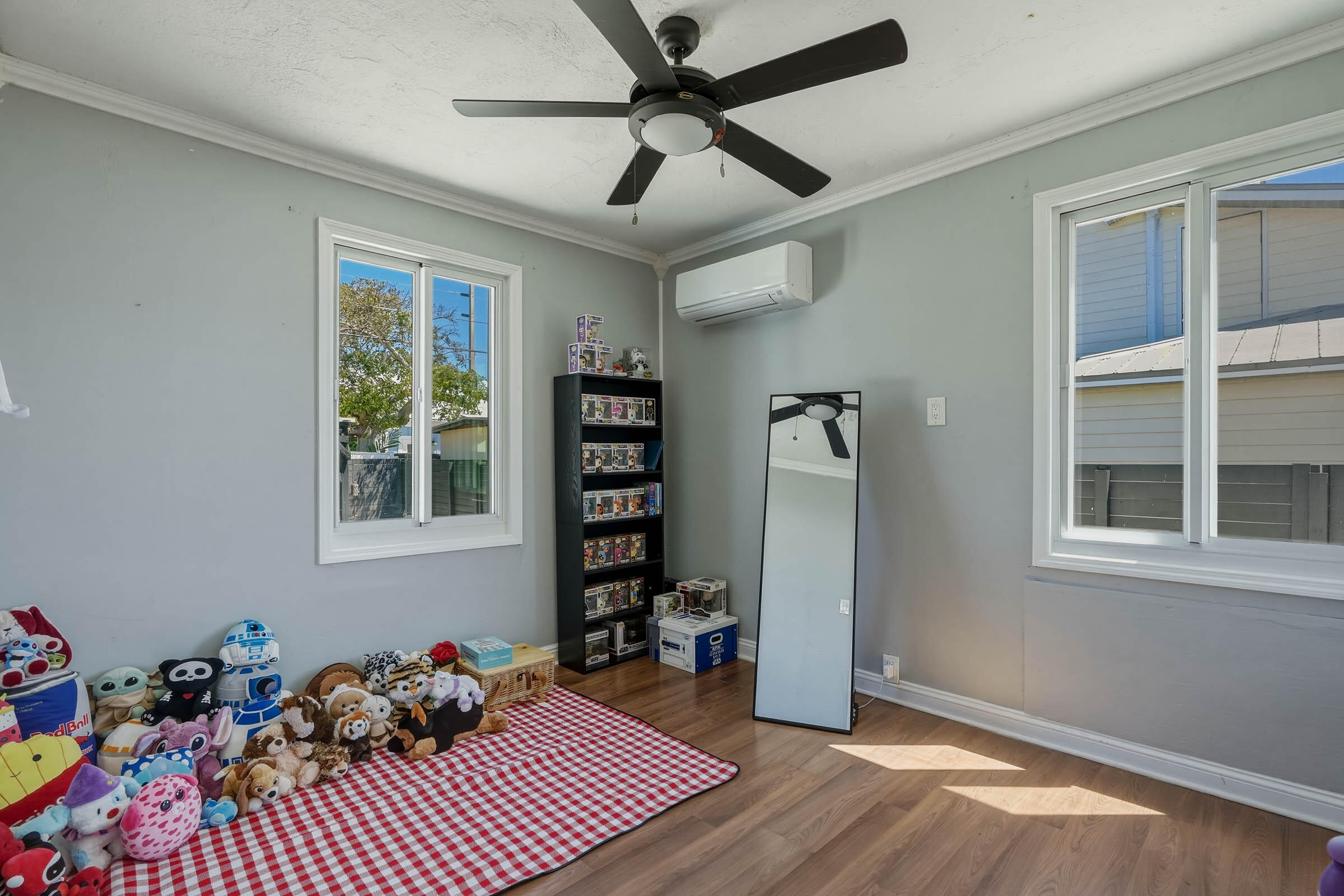 2805 Flagler Avenue Key West, FL 33040 - Photo 40 of 53 a bedroom with furniture and a window