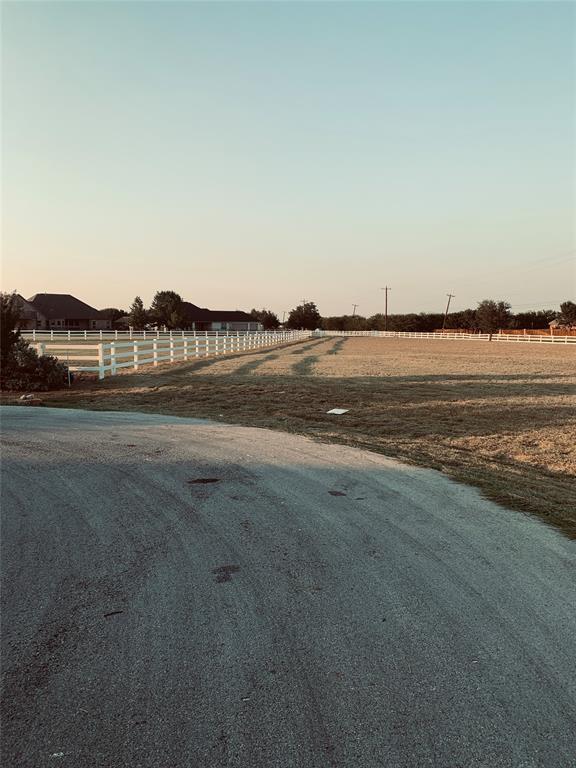 12916 Whisper Willows Court Fort Worth, TX 76052 - Photo 5 of 11 a view of an ocean and beach