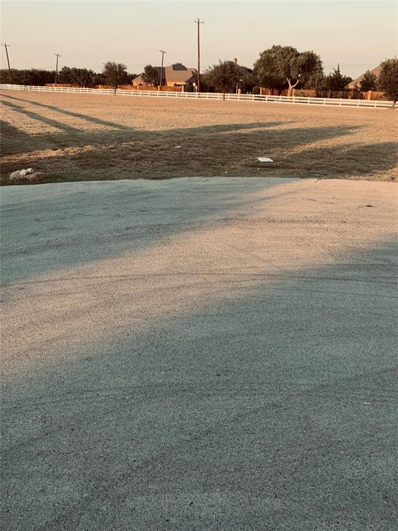 12916 Whisper Willows Court Fort Worth, TX 76052 - Photo 7 of 11 a view of an ocean and beach