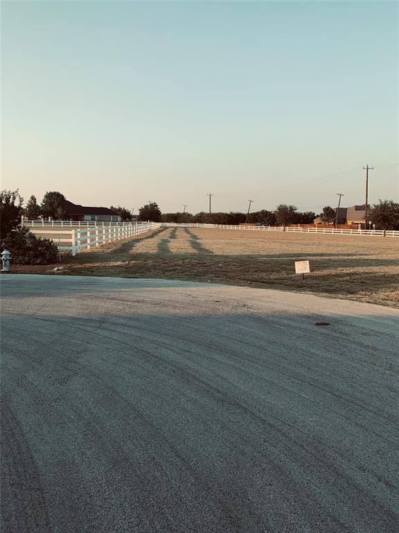 12916 Whisper Willows Court Fort Worth, TX 76052 - Photo 9 of 11 a view of lake view and mountain view
