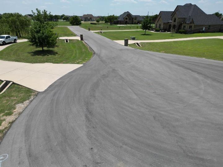 12916 Whisper Willows Court Fort Worth, TX 76052 - Photo 10 of 11 a view of a park with large trees