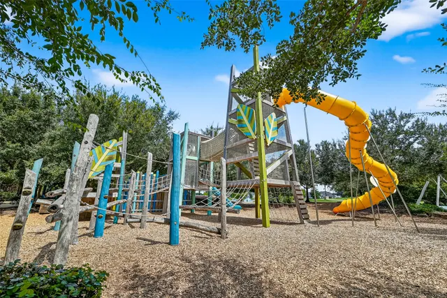 a view of a park with of a house