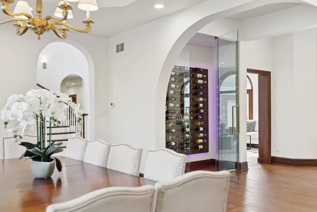 a bathroom with a sink and a large mirror