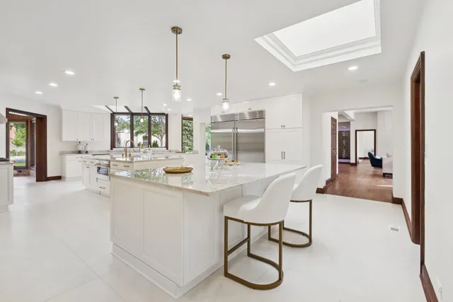a kitchen with sink and window