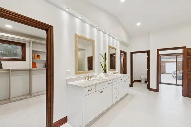 a front view of a house with a yard table and chairs