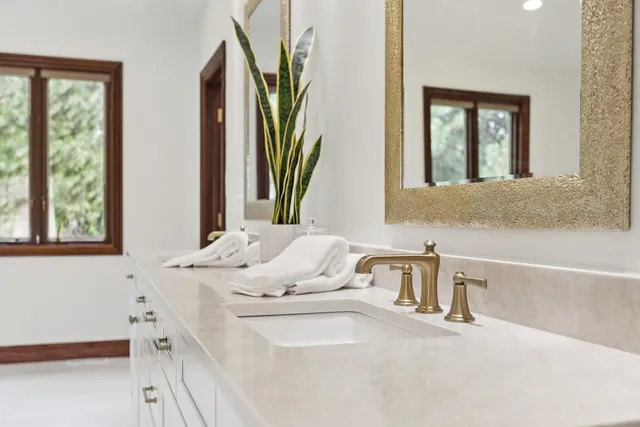 an aerial view of a house with outdoor space and street view