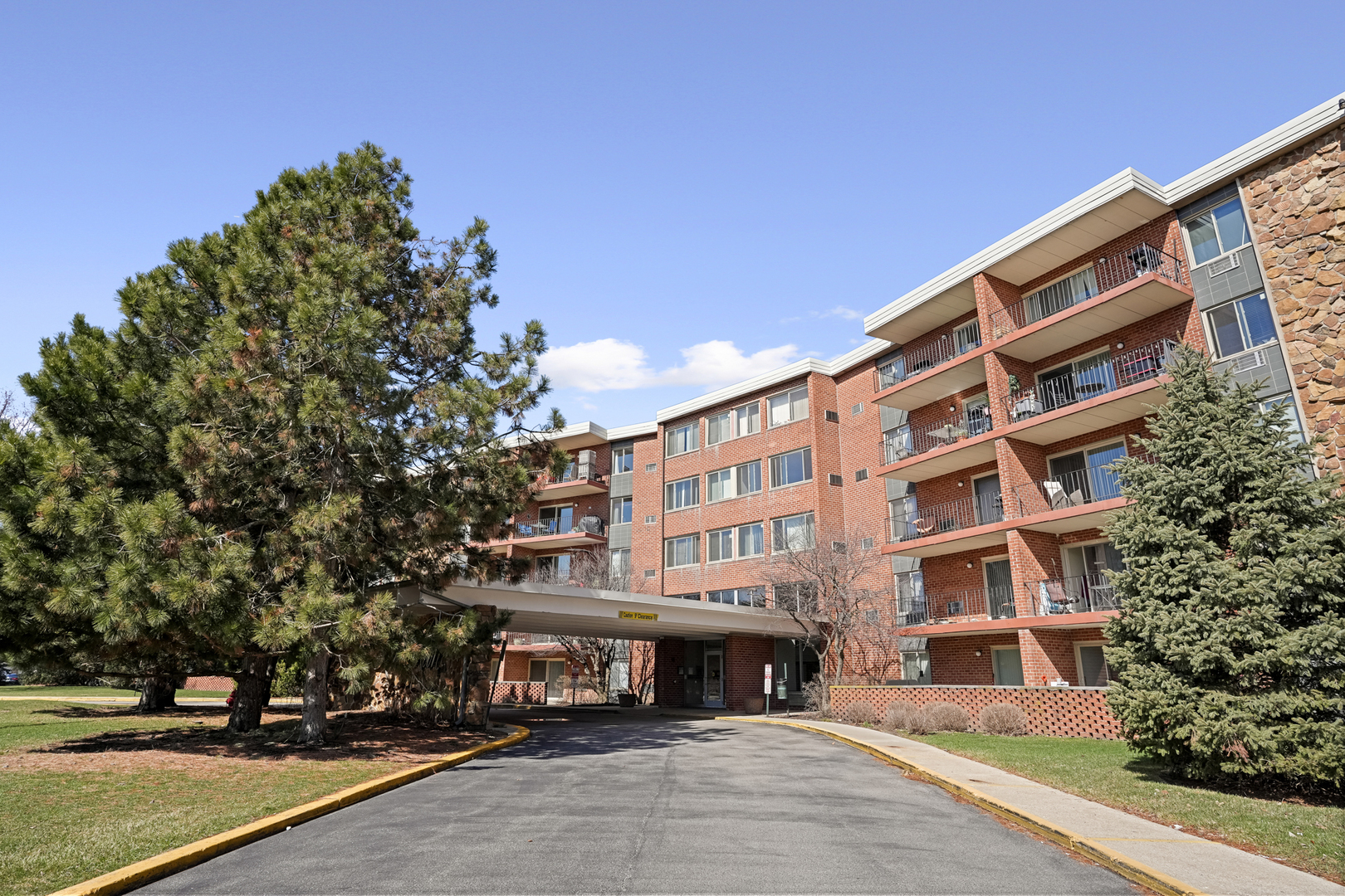 a front view of a building with street view