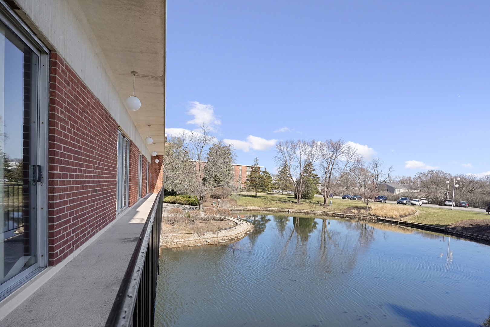 16 East Old Willow Road, Unit 223S Prospect Heights, IL 60070 - Photo 21 of 27 a view of a lake with a city