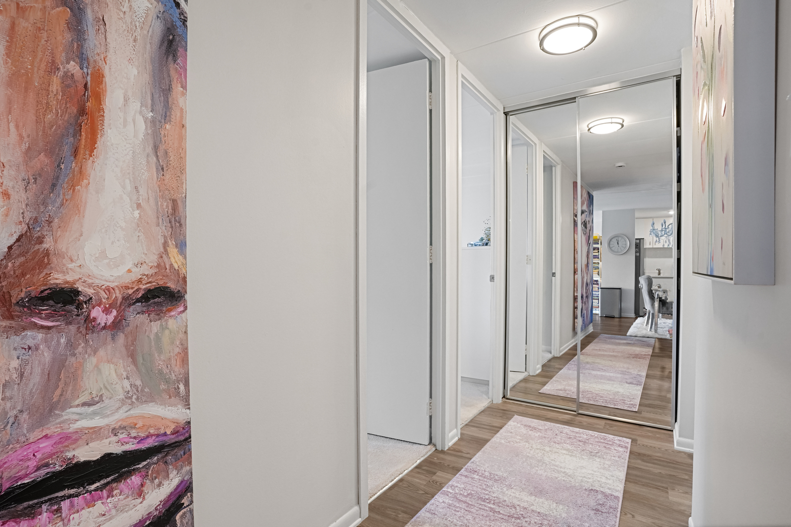 16 East Old Willow Road, Unit 223S Prospect Heights, IL 60070 - Photo 7 of 27 a view of a hallway and a livingroom with furniture