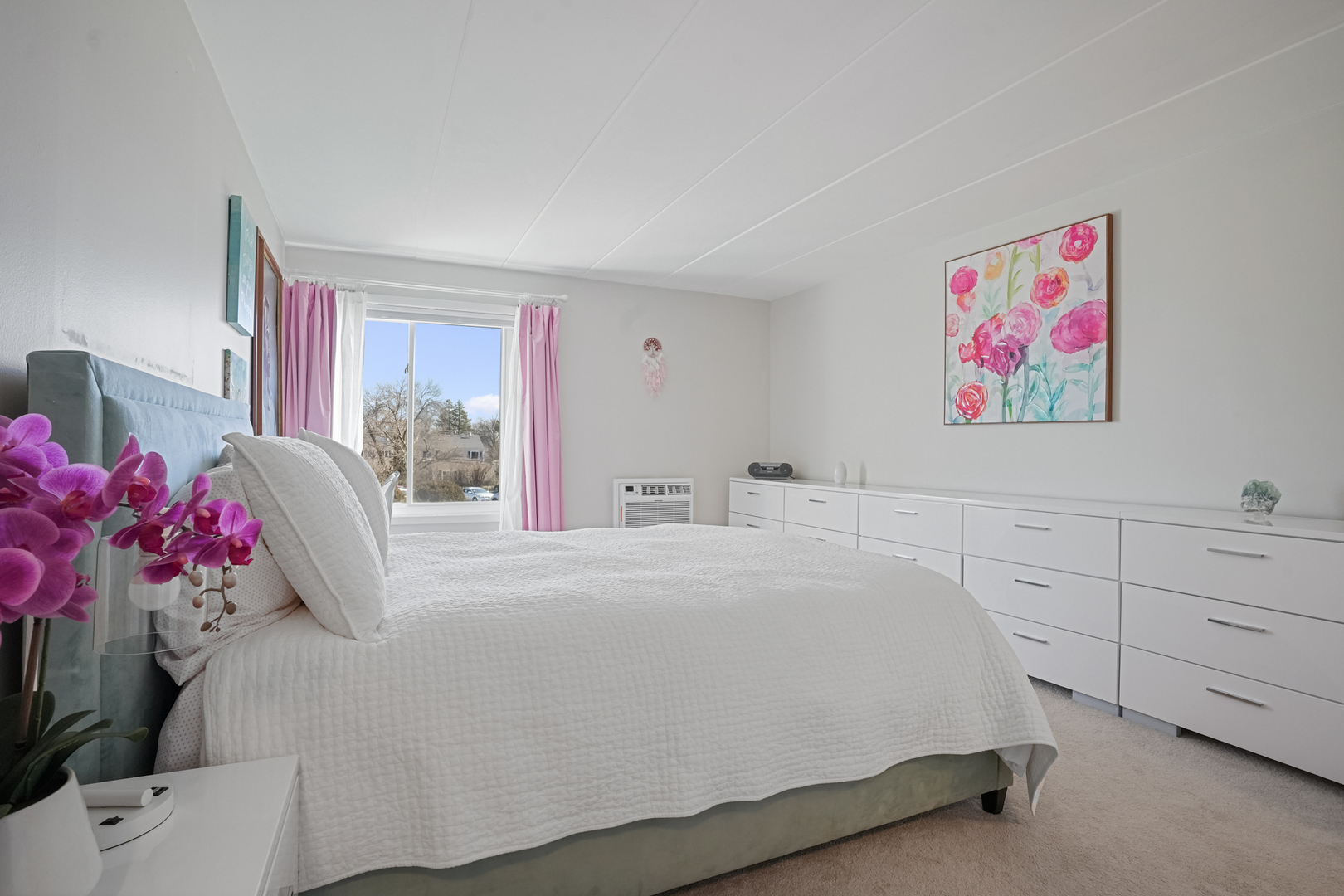 16 East Old Willow Road, Unit 223S Prospect Heights, IL 60070 - Photo 8 of 27 a bedroom with a bed dresser and window