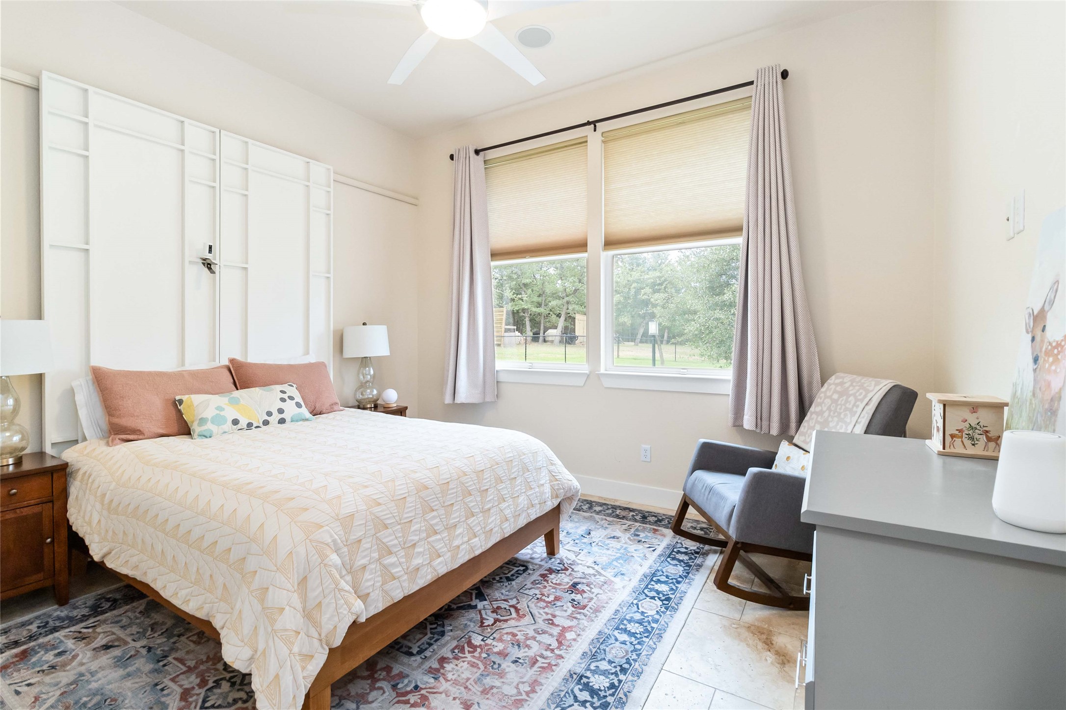 129 Powder Horn Road Bastrop, TX 78602 - Photo 14 of 27 Bedroom featuring ceiling fan and light tile patterned floors