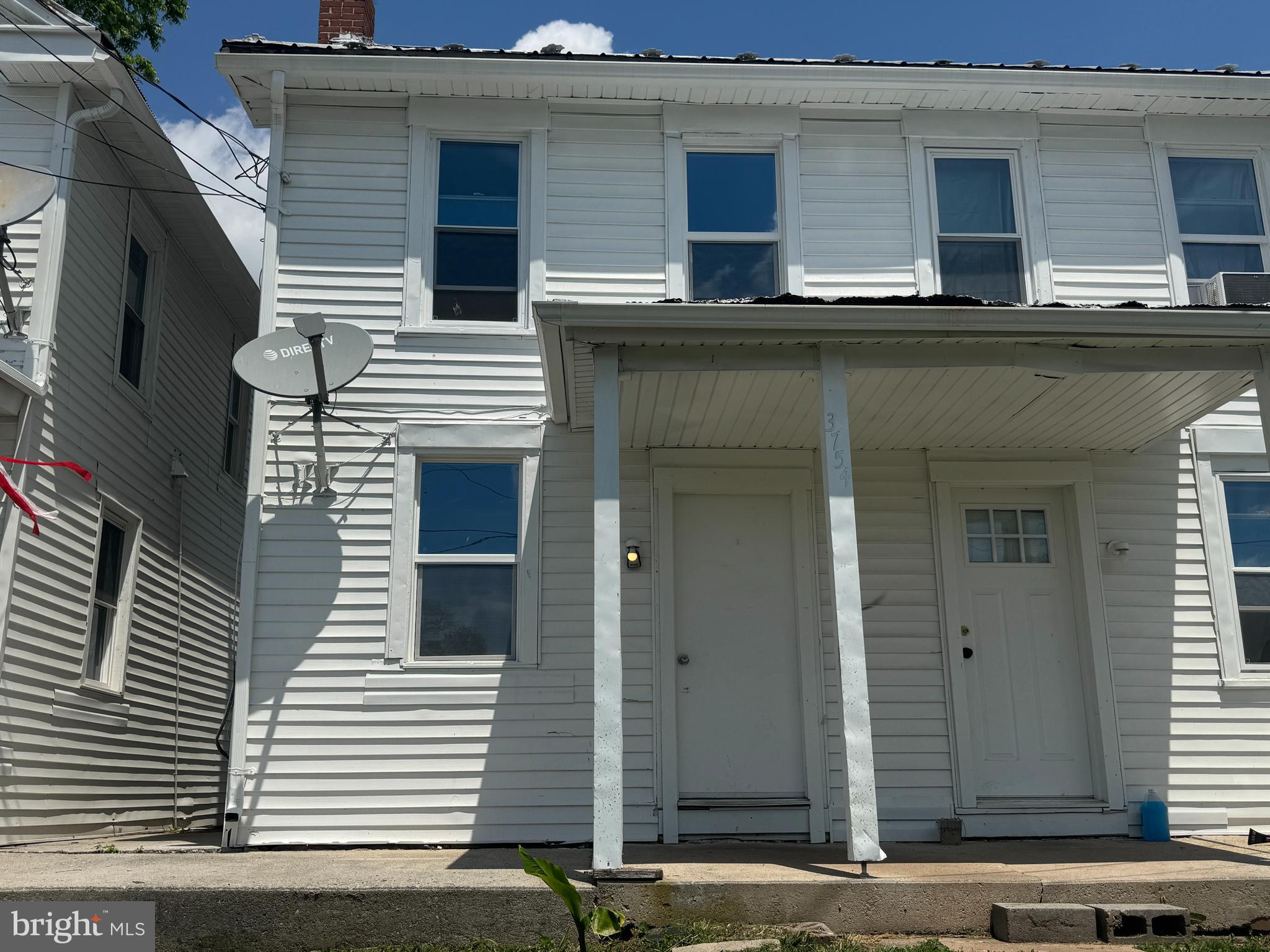 3754 Baltimore Pike, Unit 3 Littlestown, PA 17340 - Photo 3 of 21 a view of a house with a door and a large window