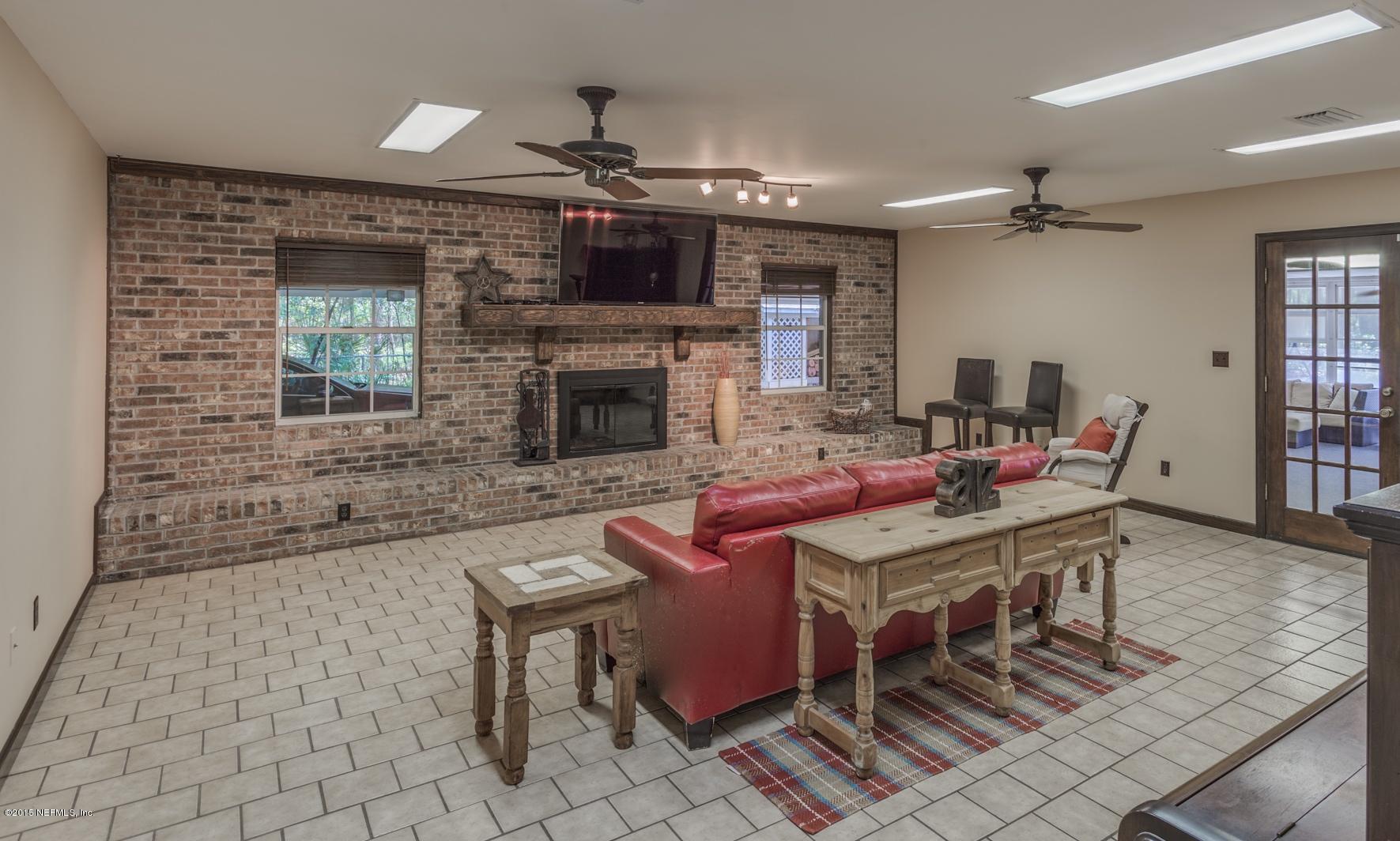 1590 Gately Road Jacksonville, FL 32225 - Photo 25 of 40 Huge Den leads to Outdoors