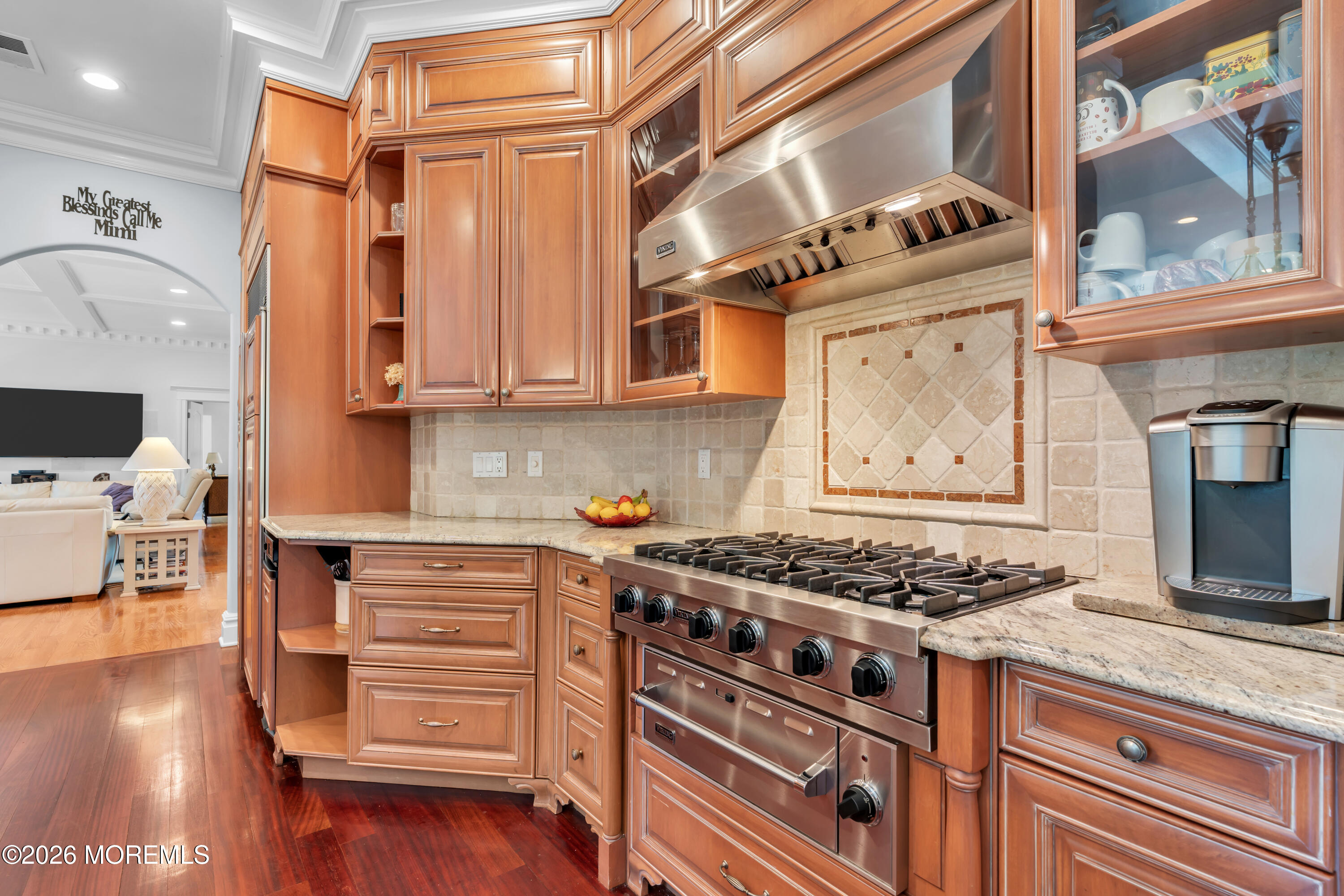600 Little Silver Point Road Little Silver, NJ 07739 - Photo 18 of 55 a kitchen with stainless steel appliances granite countertop a stove and a wooden cabinets