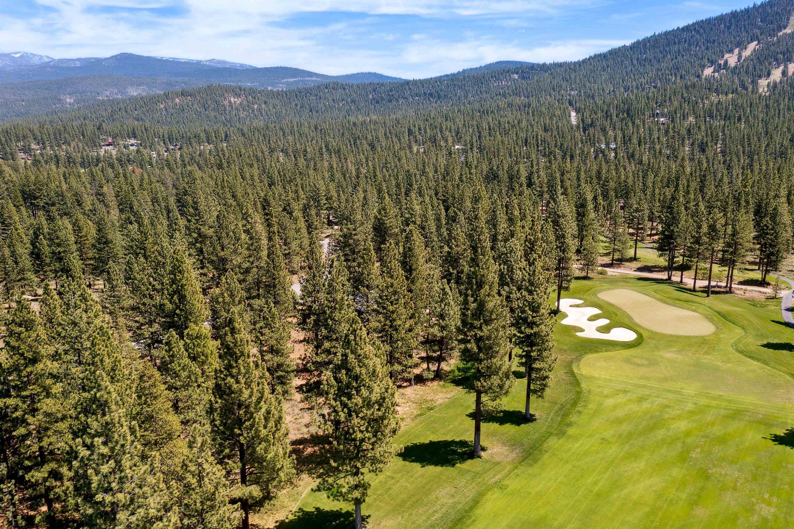 8201 Lahontan Drive Truckee, CA 96161 - Photo 1 of 28 a view of a city with mountains in the background